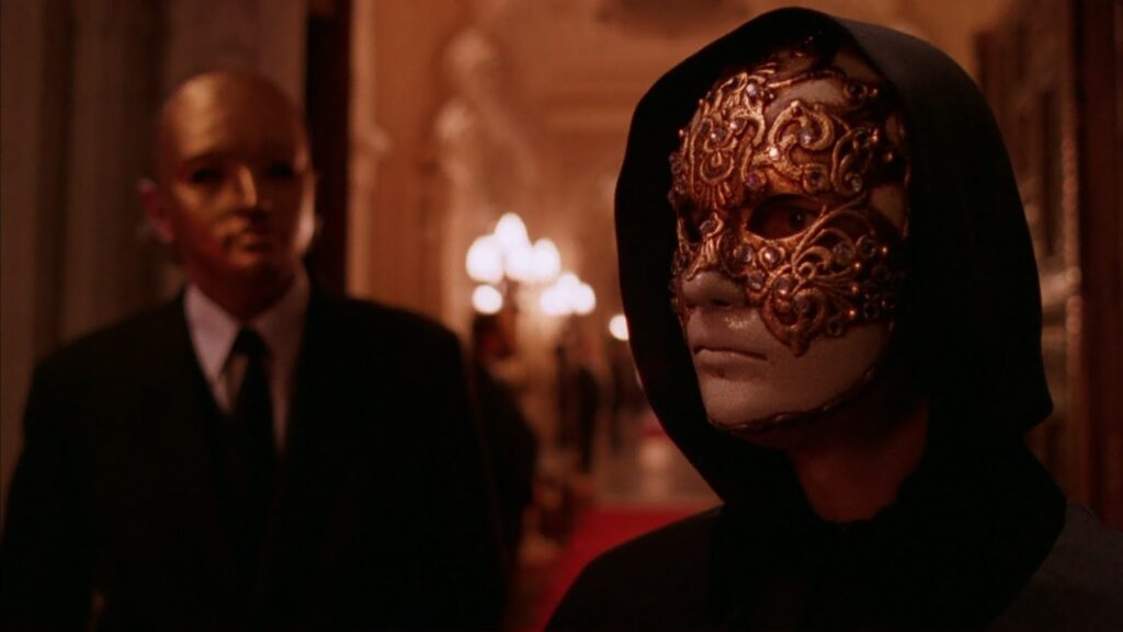 Tom Cruise (right) in a still from Eyes Wide Shut