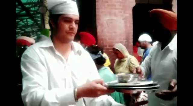 Major Mohommed Ali Shah doing seva at the Golden Temple in Amritsar, Punjab
