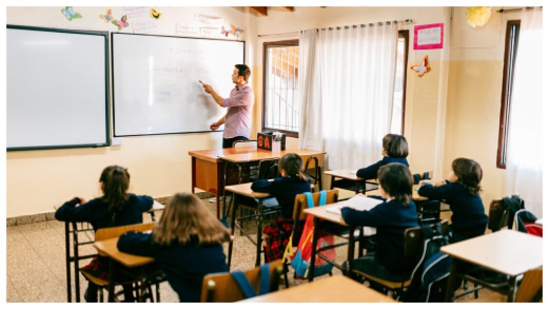 A teacher teaching students in a classroom