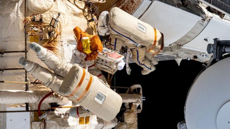 Russian Cosmonaut Rides Robotic Arm in Milestone Spacewalk at the International Space Station