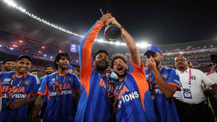 Suryakumar Yadav and Tilak Verma, with Sanju Samson at the center, joined by Kuldeep Yadav holding the trophy and Varun Chakravarthy during India’s T20 World Cup 2026 victory celebration